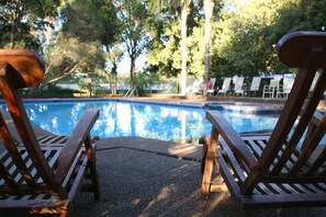 Outdoor pool, open 8 AM to 6 PM, pool loungers