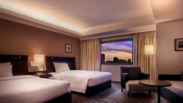 Premium bedding, down duvets, in-room safe, desk