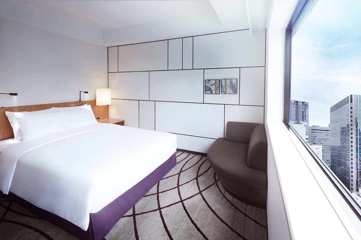 Premium bedding, down comforters, in-room safe, desk