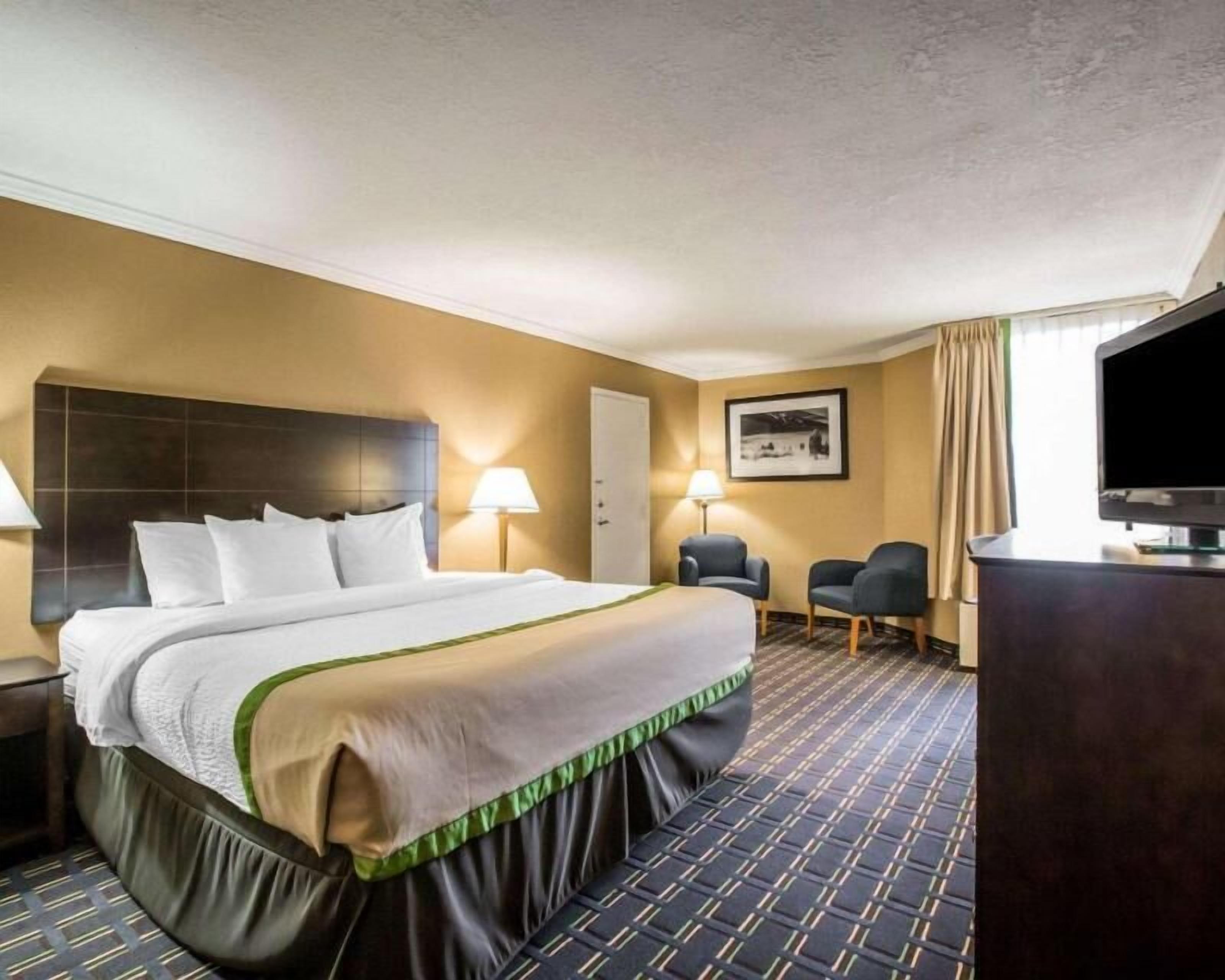 Premium bedding, pillow-top beds, desk, blackout curtains