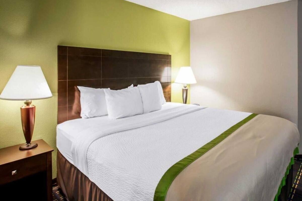 Premium bedding, pillow-top beds, desk, blackout curtains