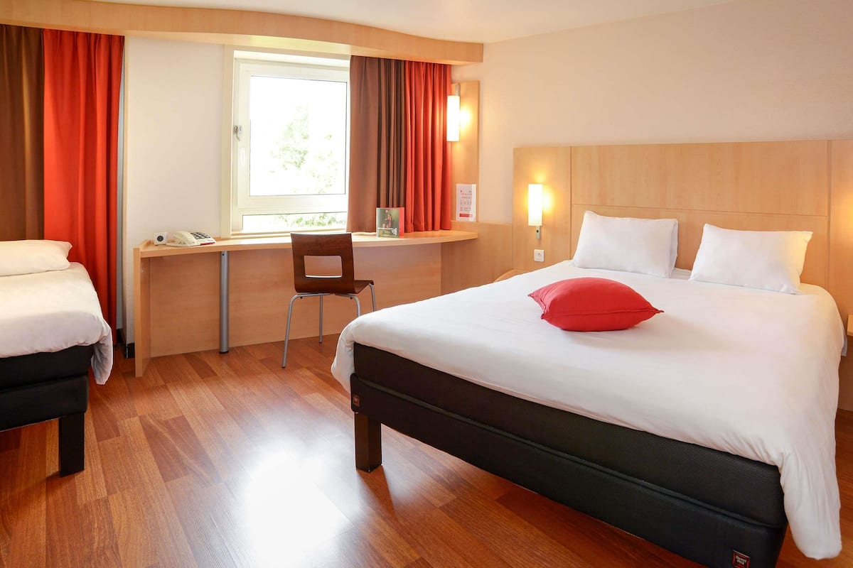 Accessible room with a double bed and a single bed | Premium bedding, desk, laptop workspace, blackout curtains