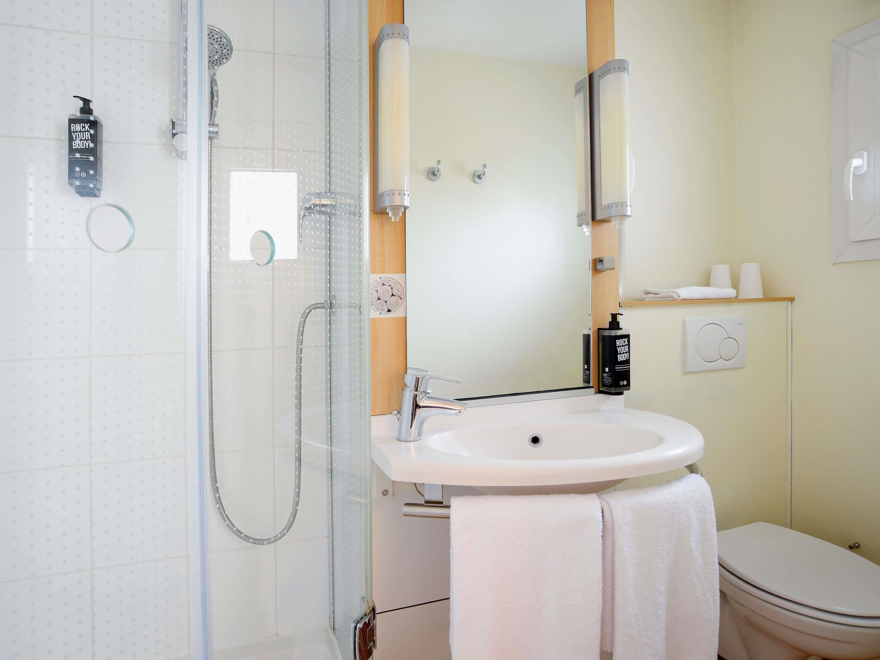 premium bedding, desk, laptop workspace, blackout curtains