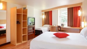 Accessible room with a double bed and a single bed | Premium bedding, desk, laptop workspace, blackout drapes