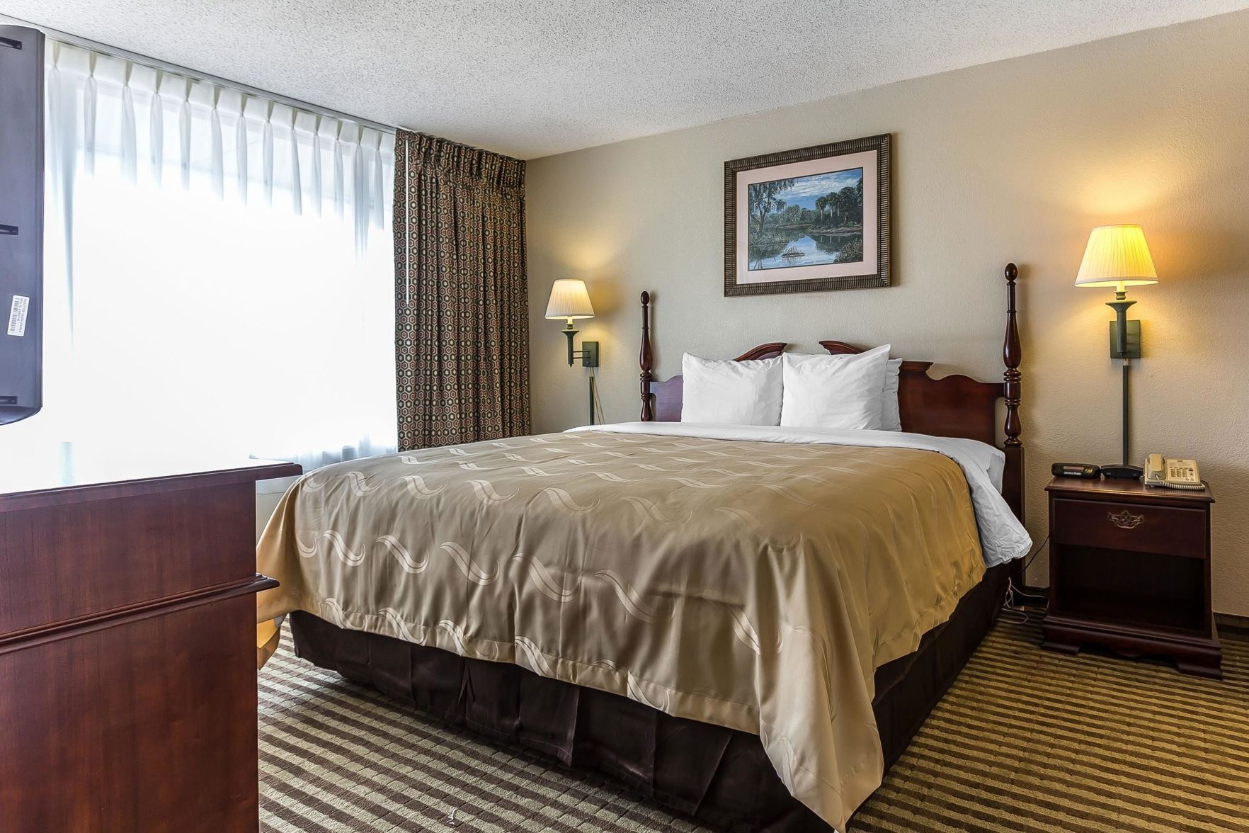 Premium bedding, pillow-top beds, desk, laptop workspace
