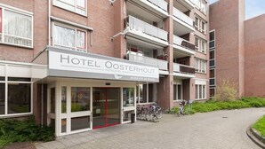 A hotel entrance with a sign reading "Hotel Oosterhout." - A-Hotel Oosterhout (Oosterhout)