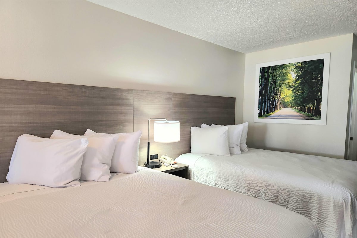 Standard Room, 2 Queen Beds | Pillow-top beds, desk, blackout curtains, iron/ironing board