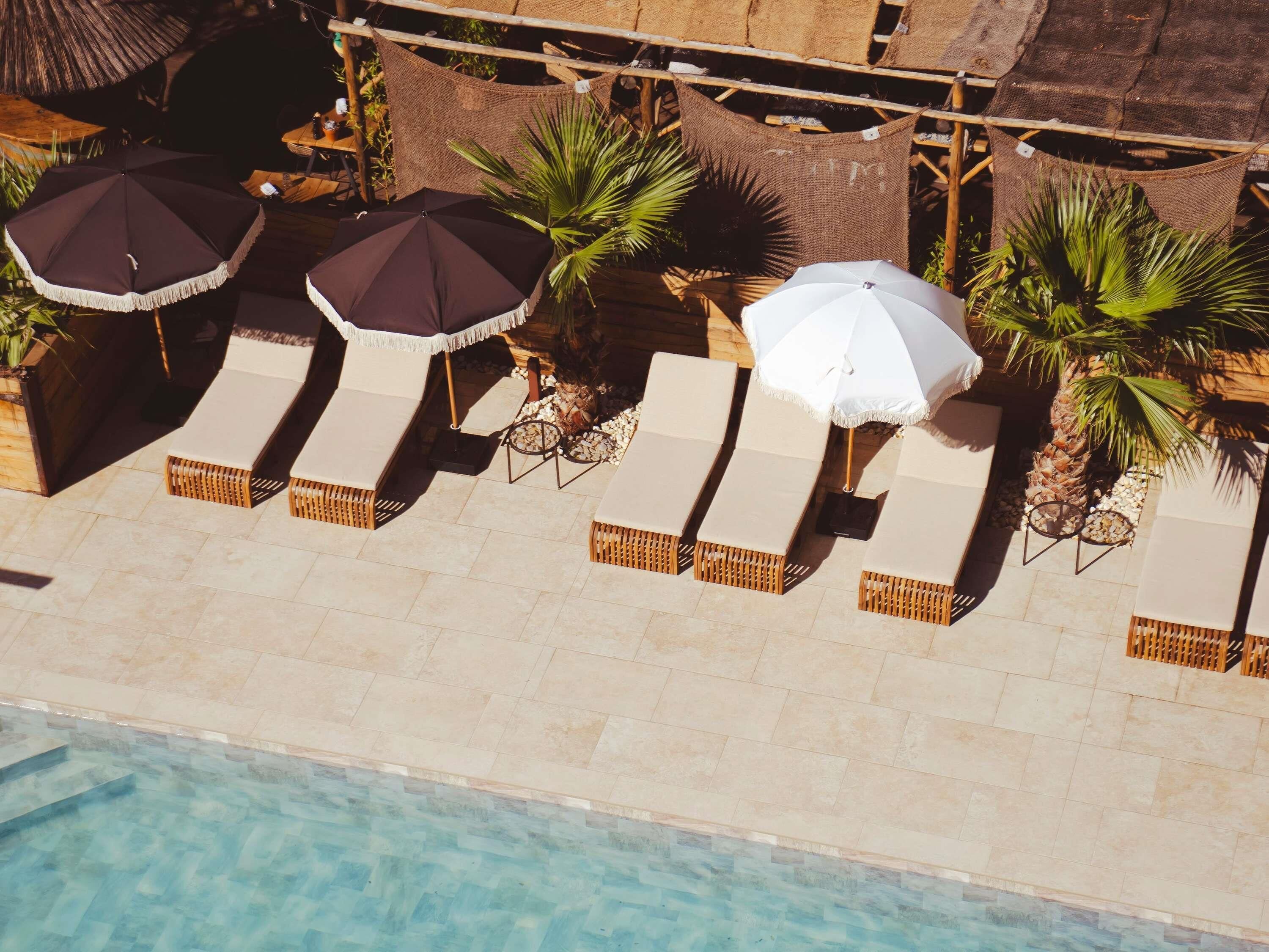 Outdoor pool, pool umbrellas, pool loungers