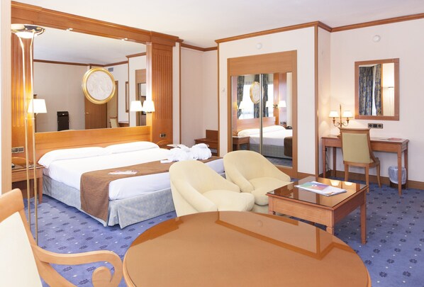 Pillow-top beds, minibar, in-room safe, desk