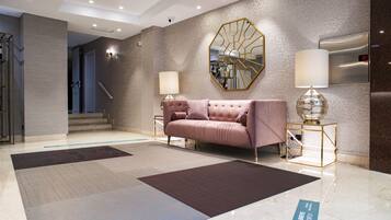 Standaard | Woonruimte | Een 23-inch televisie met satellietzenders en betaalfilms