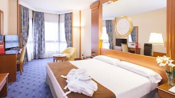 Surmatelas, minibar, coffres-forts dans les chambres, bureau