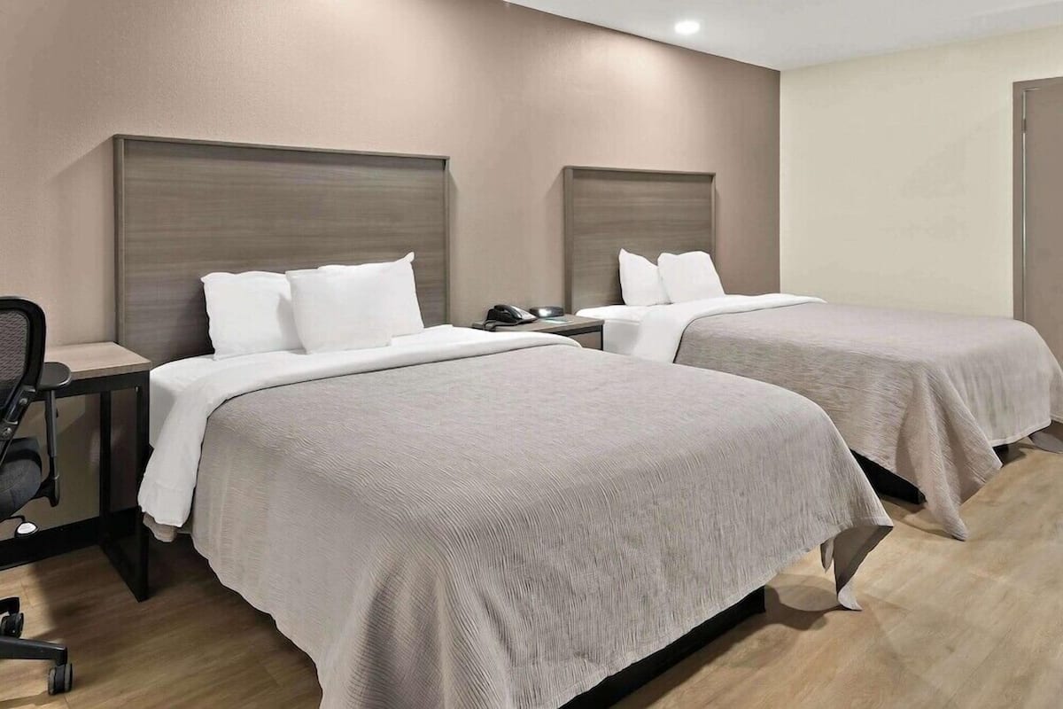 Premium bedding, desk, blackout drapes, soundproofing