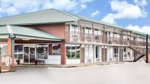 A two-story building with a flat roof and large windows. - Days Inn by Wyndham Newport (Newport)