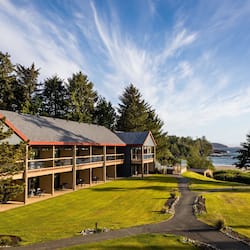 Guests can enjoy a scenic ocean view from the property's beautifully maintained lawn.