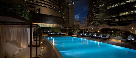 Outdoor pool, open 6:00 AM to 10:00 PM, free cabanas, pool umbrellas