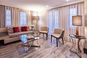 Grand Suite | Living area | 26-inch LCD TV with satellite channels, TV