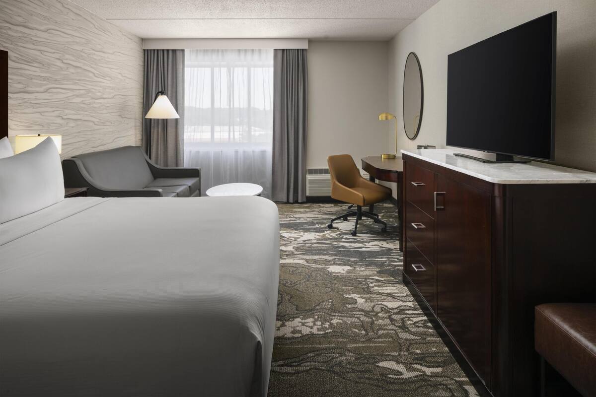Room, 1 King Bed with Sofa bed | Living area | 55-inch flat-screen TV with cable channels, TV, Netflix