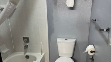 Deluxe Suite, 1 Bedroom | Bathroom | Combined shower/tub, free toiletries, hair dryer, towels