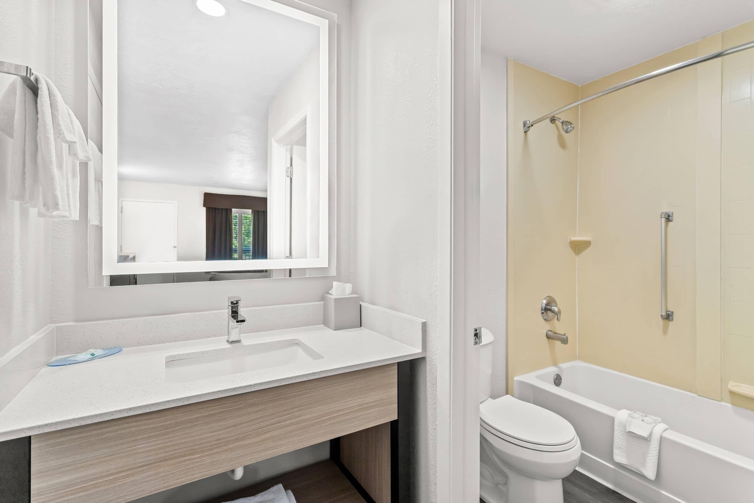 standard room, 1 king bed, non smoking | premium bedding, desk, laptop workspace, blackout curtains