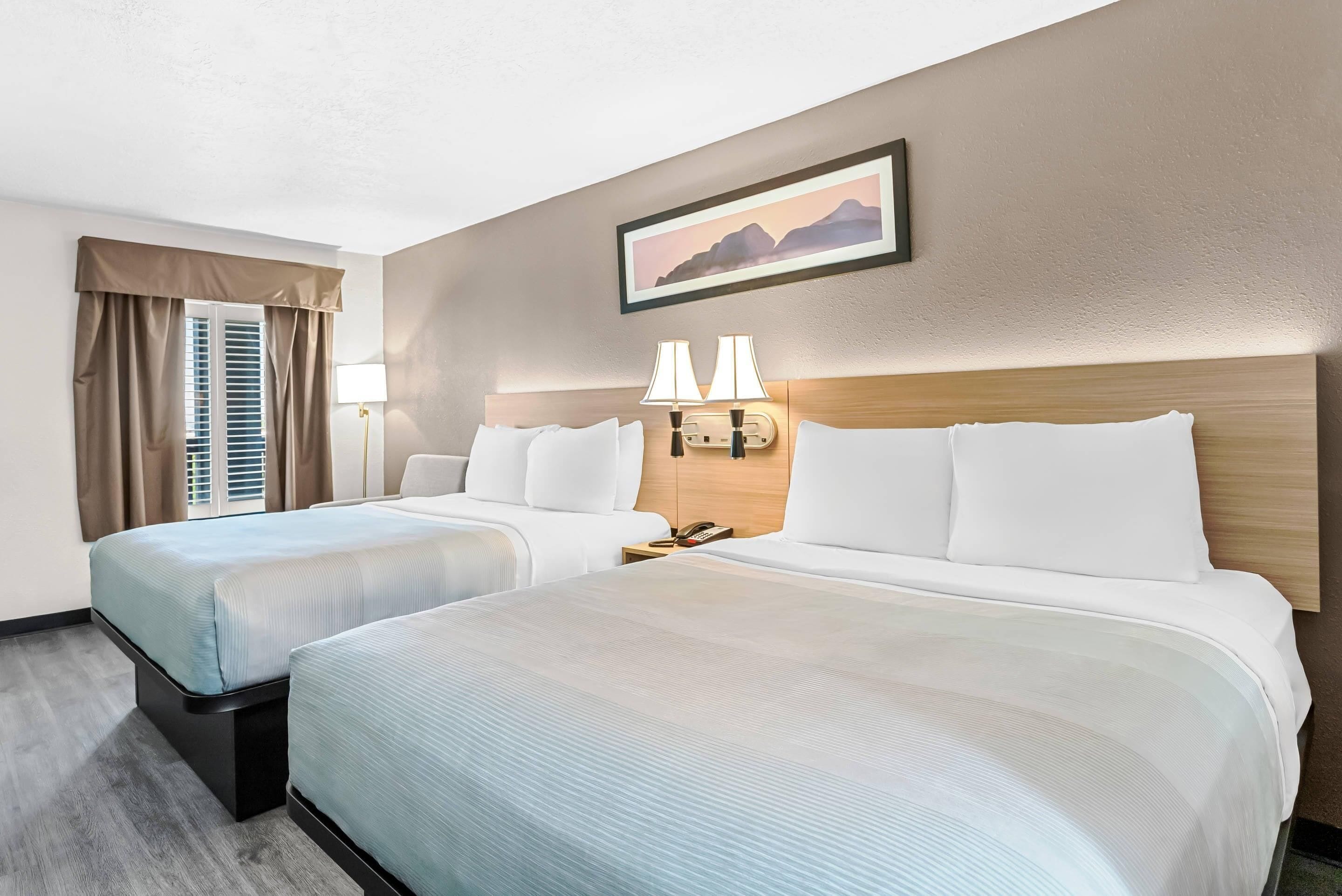 standard room, 2 queen beds, non smoking | premium bedding, desk, laptop workspace, blackout curtains