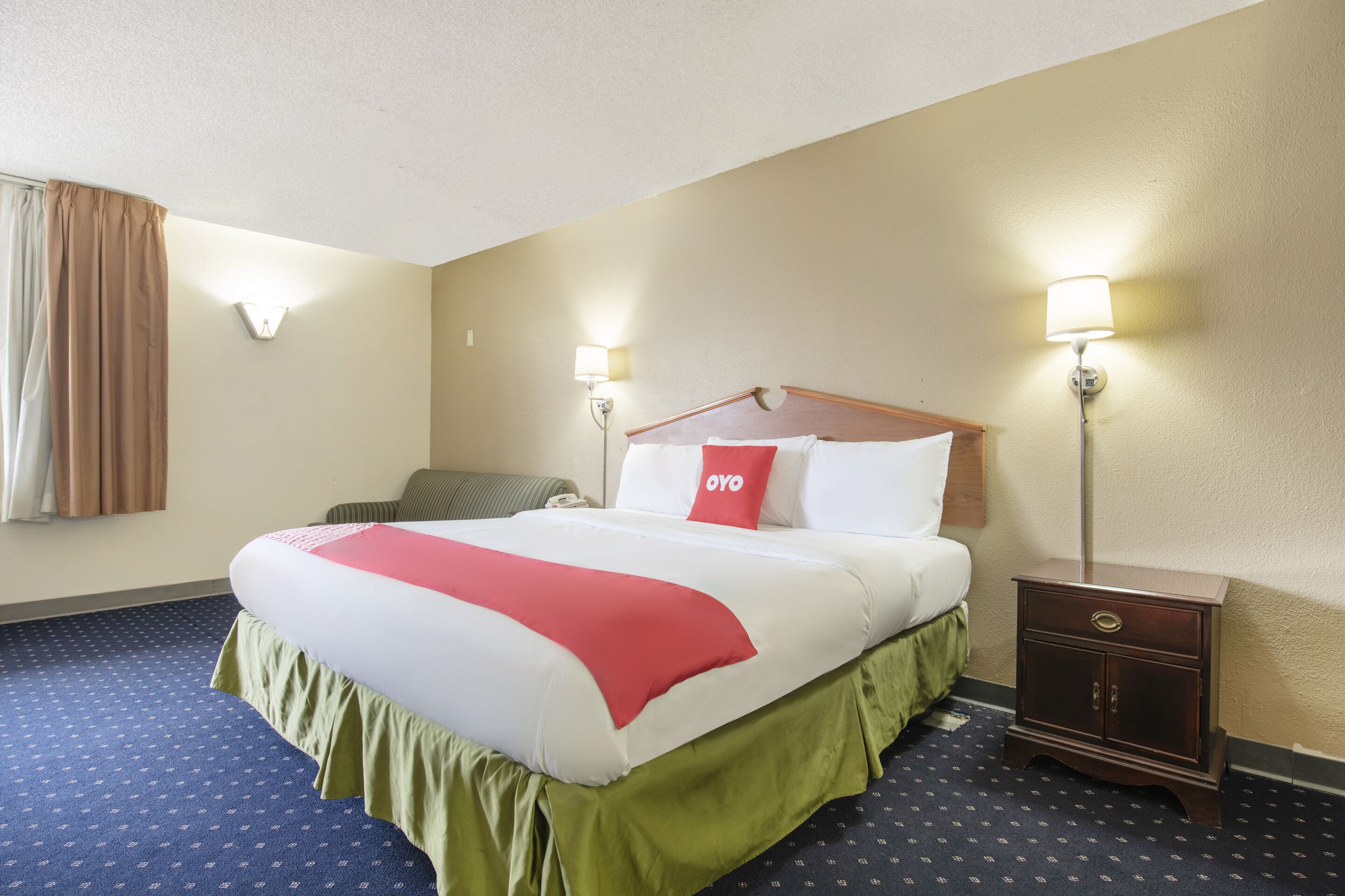 room, 1 king bed, jetted tub | desk, iron/ironing board, free wifi