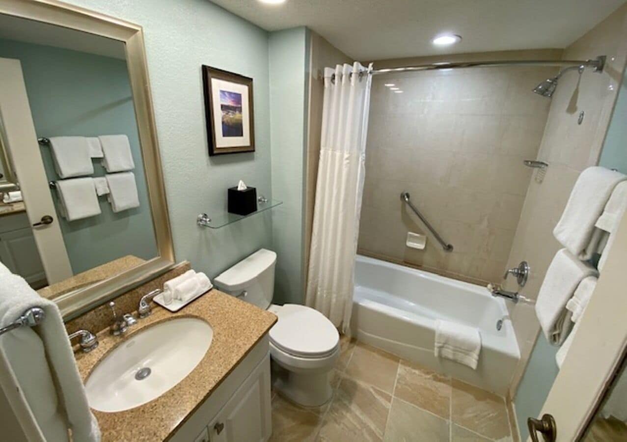 suite, 2 queen beds (1k-2q) | bathroom | combined shower/bathtub, hair dryer, towels, soap
