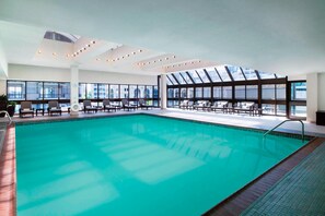 Indoor pool, open 5:00 AM to 11:00 PM, pool loungers