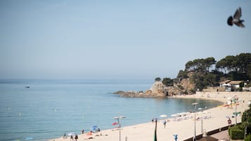 On the beach, beach towels, beach bar, kayaking