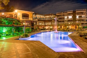 Indoor pool, outdoor pool, pool umbrellas, pool loungers