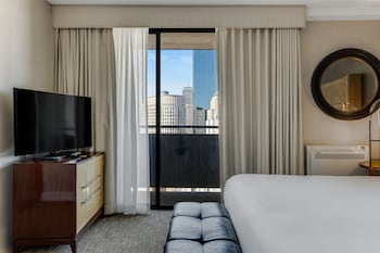 Hotel amenities such as safe, desk and work area at Revere Hotel Boston Common