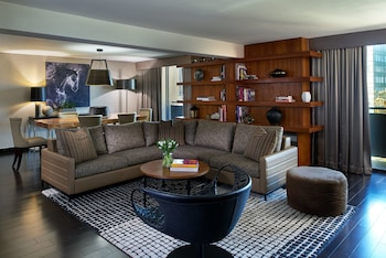 Presidential Suite (Back Bay View) | Living room | 55-inch flat-screen TV with cable channels, TV, pay movies at Revere Hotel Boston Common