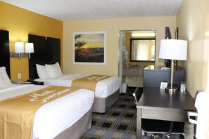 Premium bedding, blackout curtains, iron/ironing board