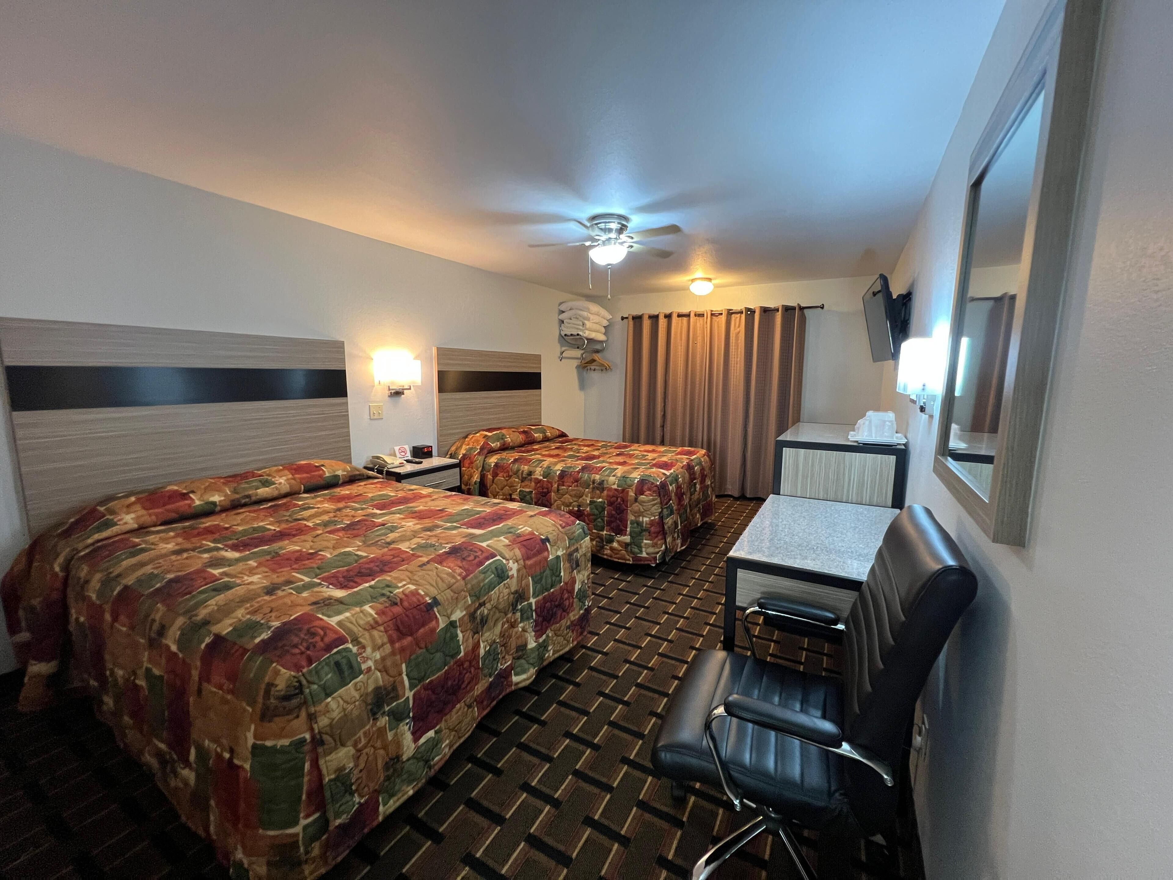 Desk, WiFi (free), alarm clocks, bed sheets
