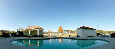 Seasonal outdoor pool, open 10 AM to 9 PM, sun loungers