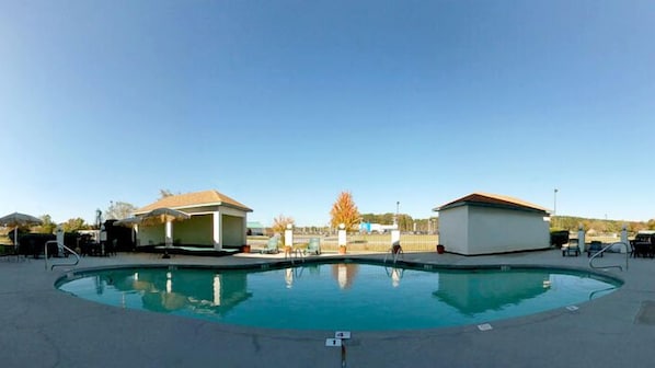 Seasonal outdoor pool, open 10 AM to 9 PM, pool loungers