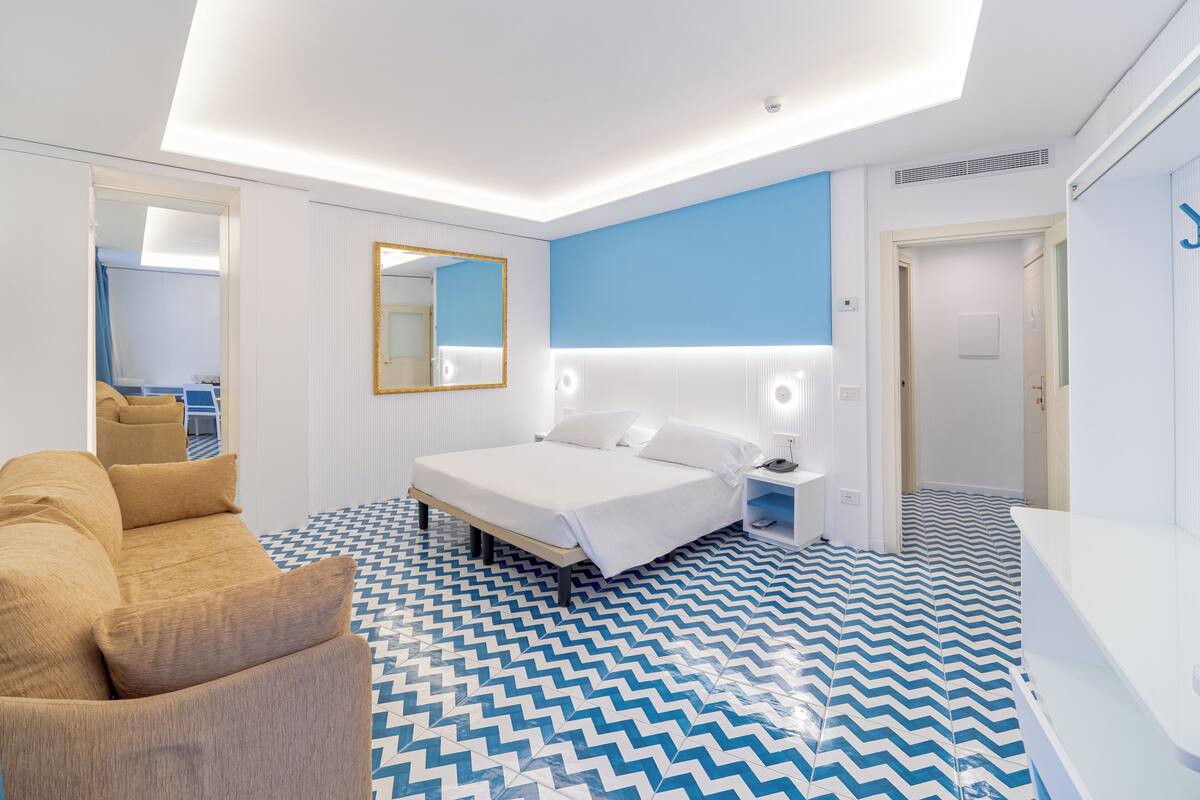 Standard Quadruple Room, 1 Bedroom | Premium bedding, minibar, in-room safe, desk