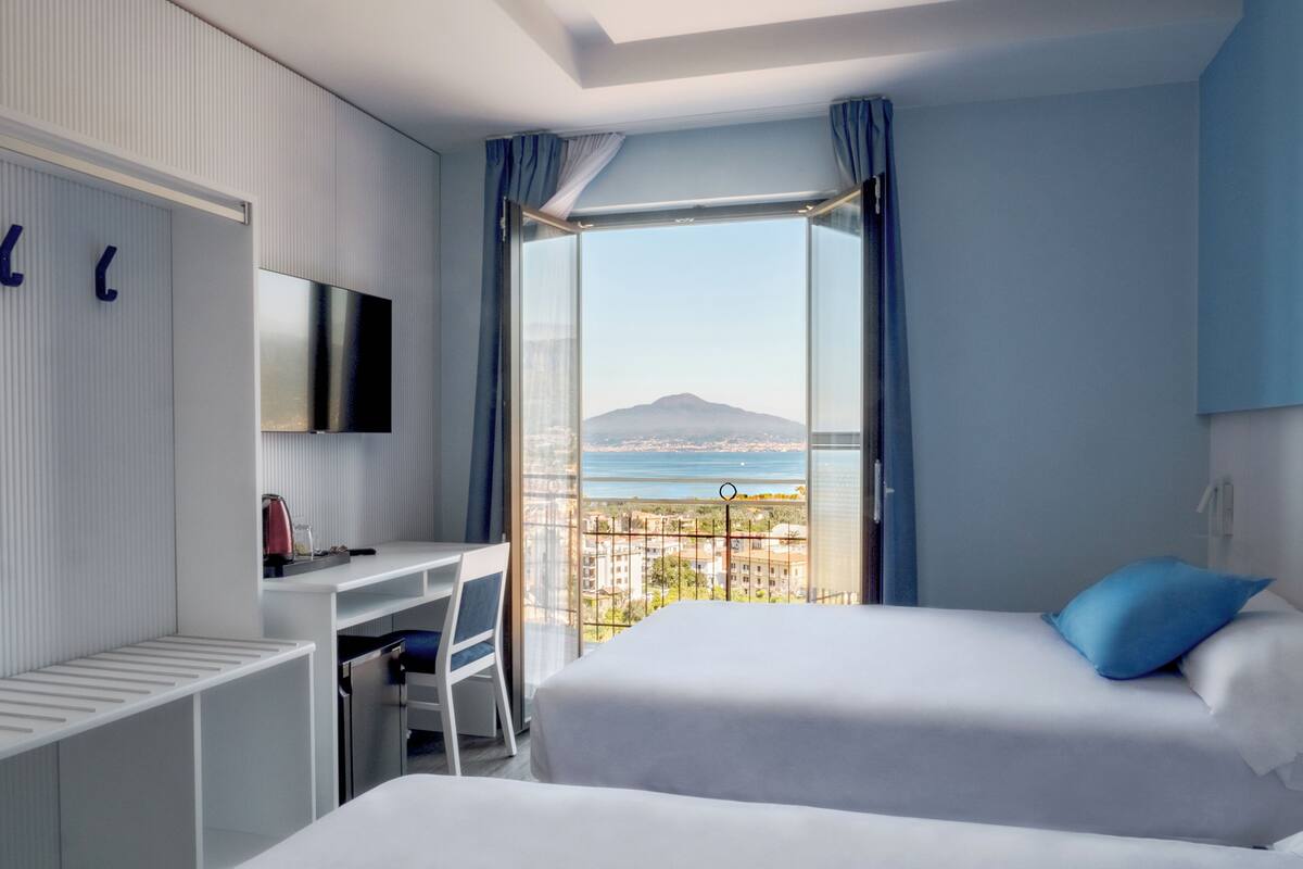 Classic Quadruple Room | Premium bedding, minibar, in-room safe, desk