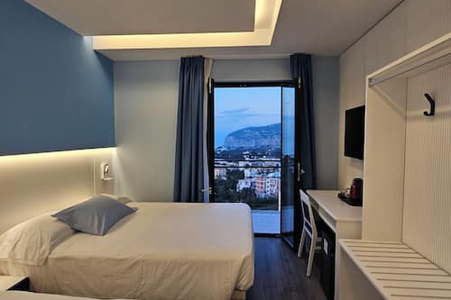 Classic Quadruple Room | Premium bedding, minibar, in-room safe, desk