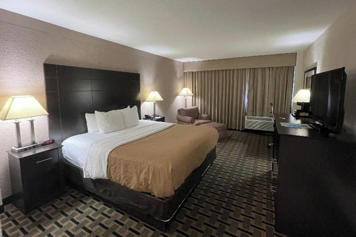 Pillowtop beds, desk, blackout drapes, iron/ironing board