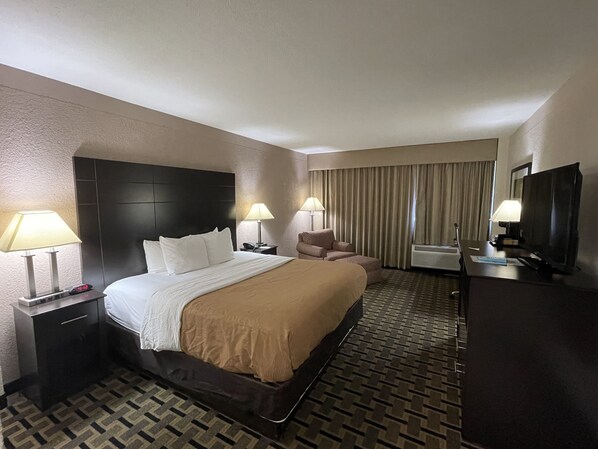 Room, 1 King Bed, Non Smoking | Pillowtop beds, desk, blackout drapes, iron/ironing board