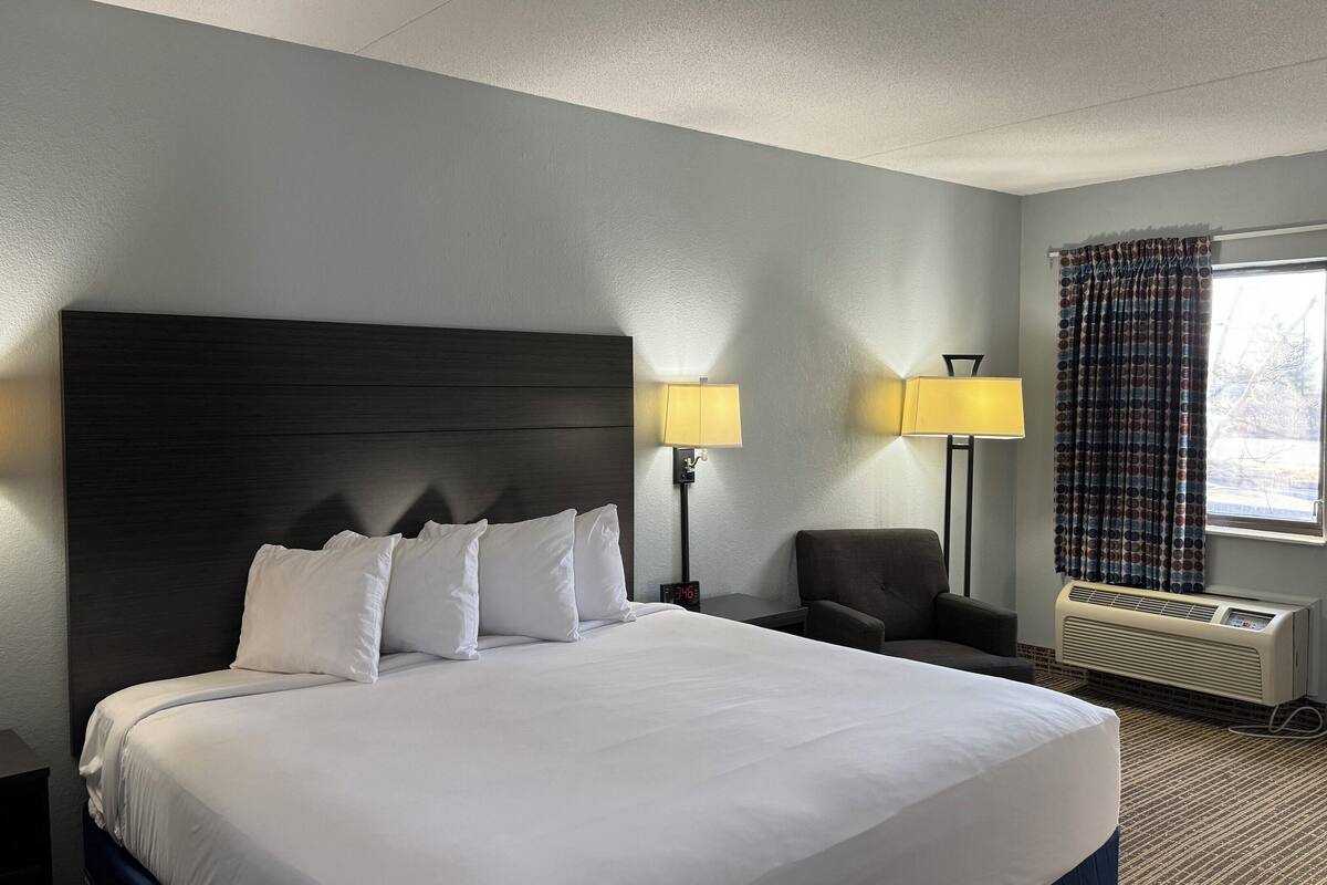 premium bedding, pillow-top beds, desk, blackout curtains