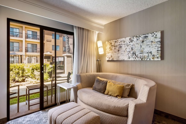 Premium bedding, pillow-top beds, desk, laptop workspace