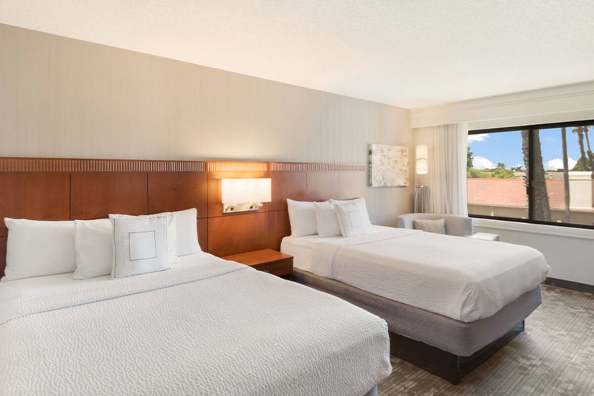 Premium bedding, pillowtop beds, desk, laptop workspace