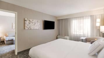 Premium bedding, pillow-top beds, desk, laptop workspace