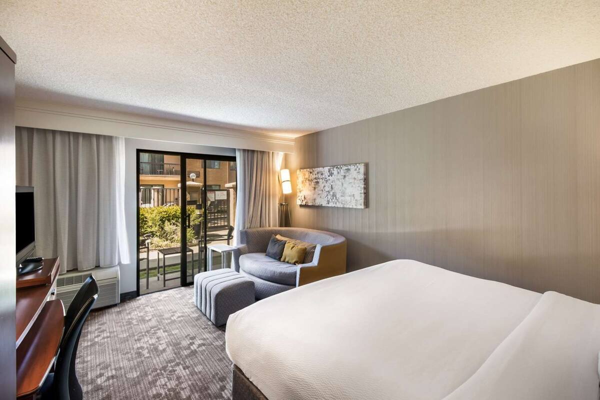 Premium bedding, pillowtop beds, desk, laptop workspace