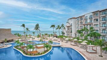 Outdoor pool, open 8:00 AM to 8:00 PM, cabanas (surcharge)