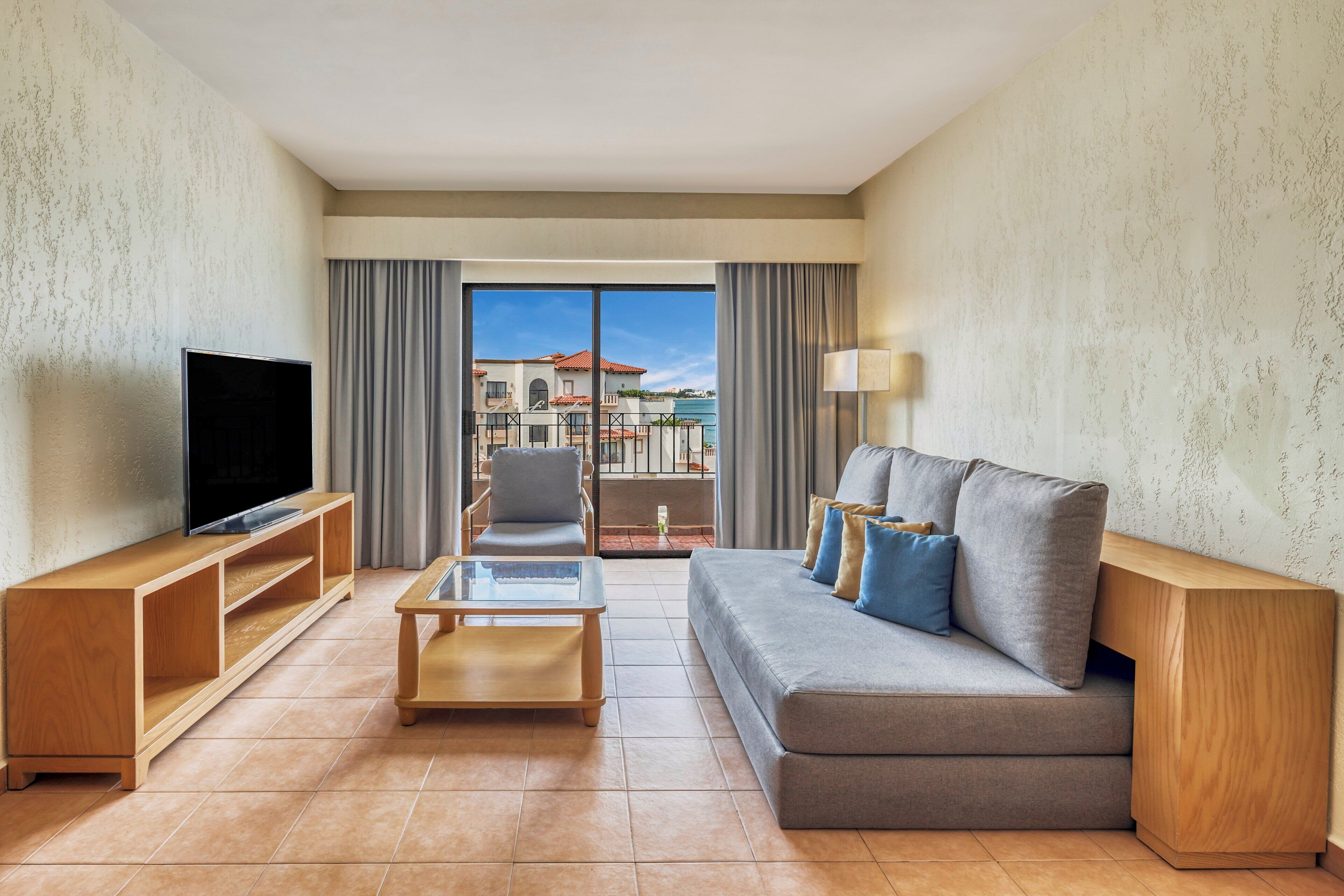 villa master suite | in-room safe, blackout curtains, iron/ironing board, free wifi