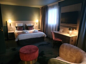 Premium bedding, pillow-top beds, free minibar, in-room safe