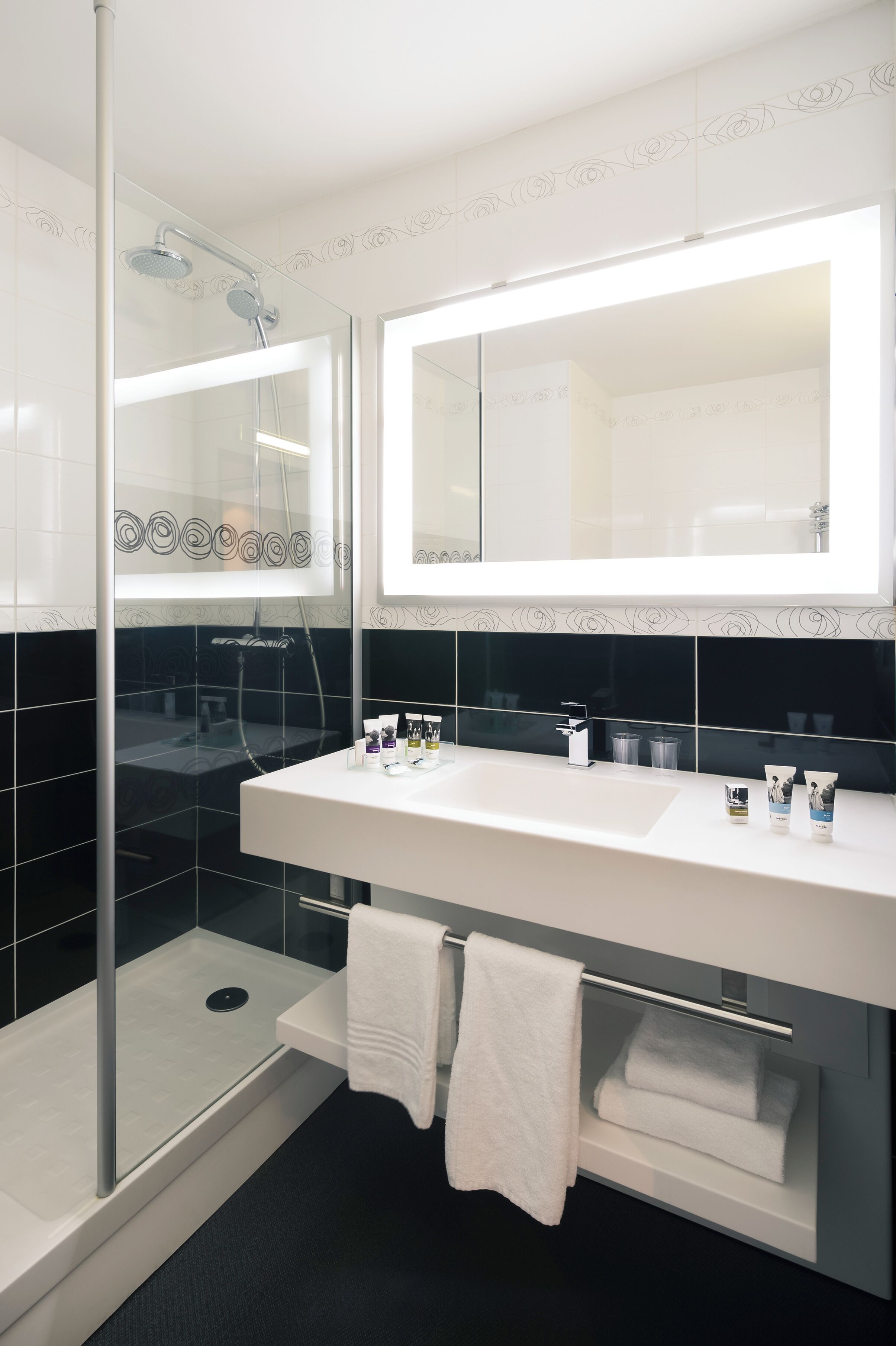 eco-friendly toiletries, hair dryer, towels