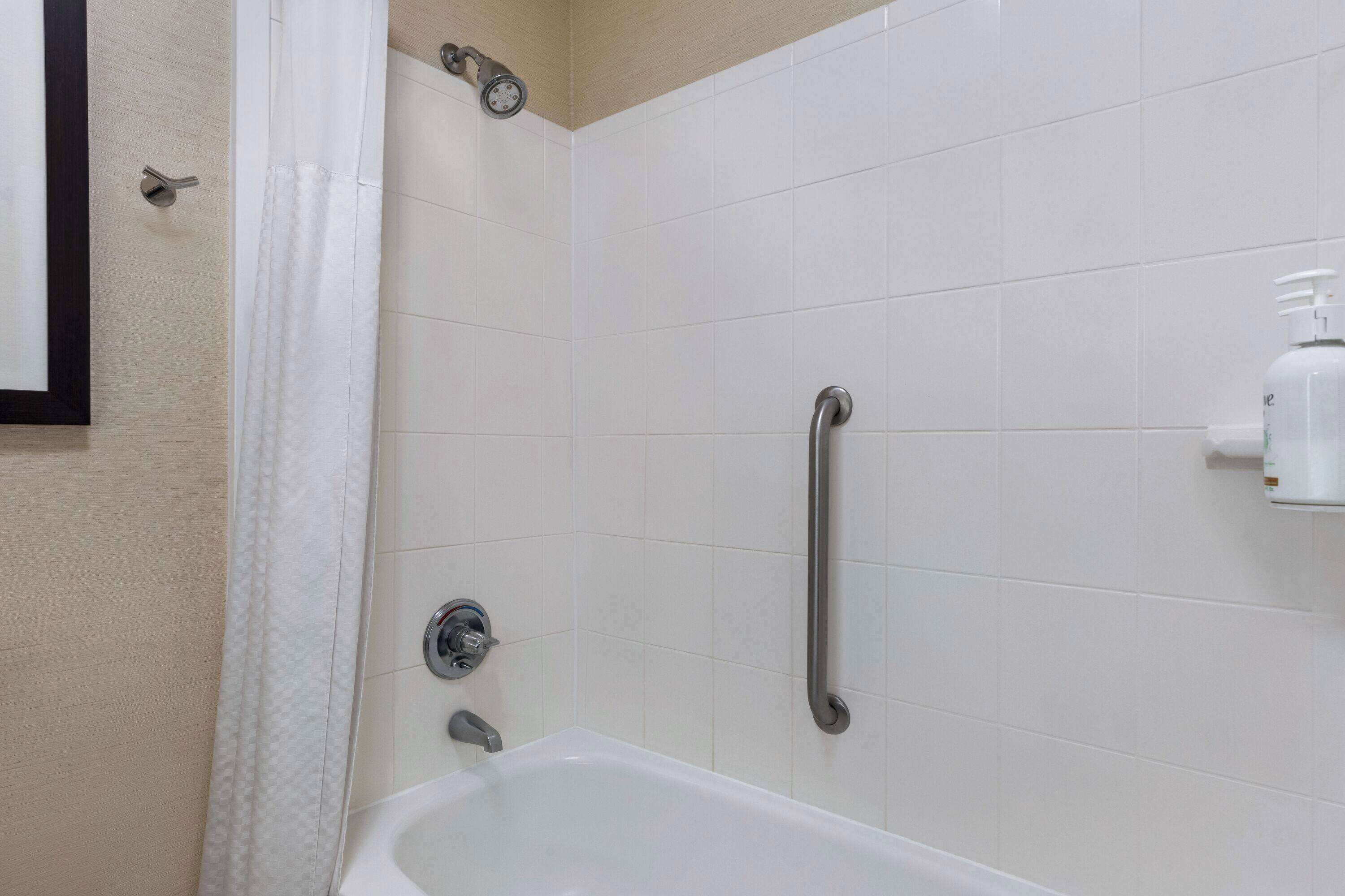 eco-friendly toiletries, hair dryer, towels